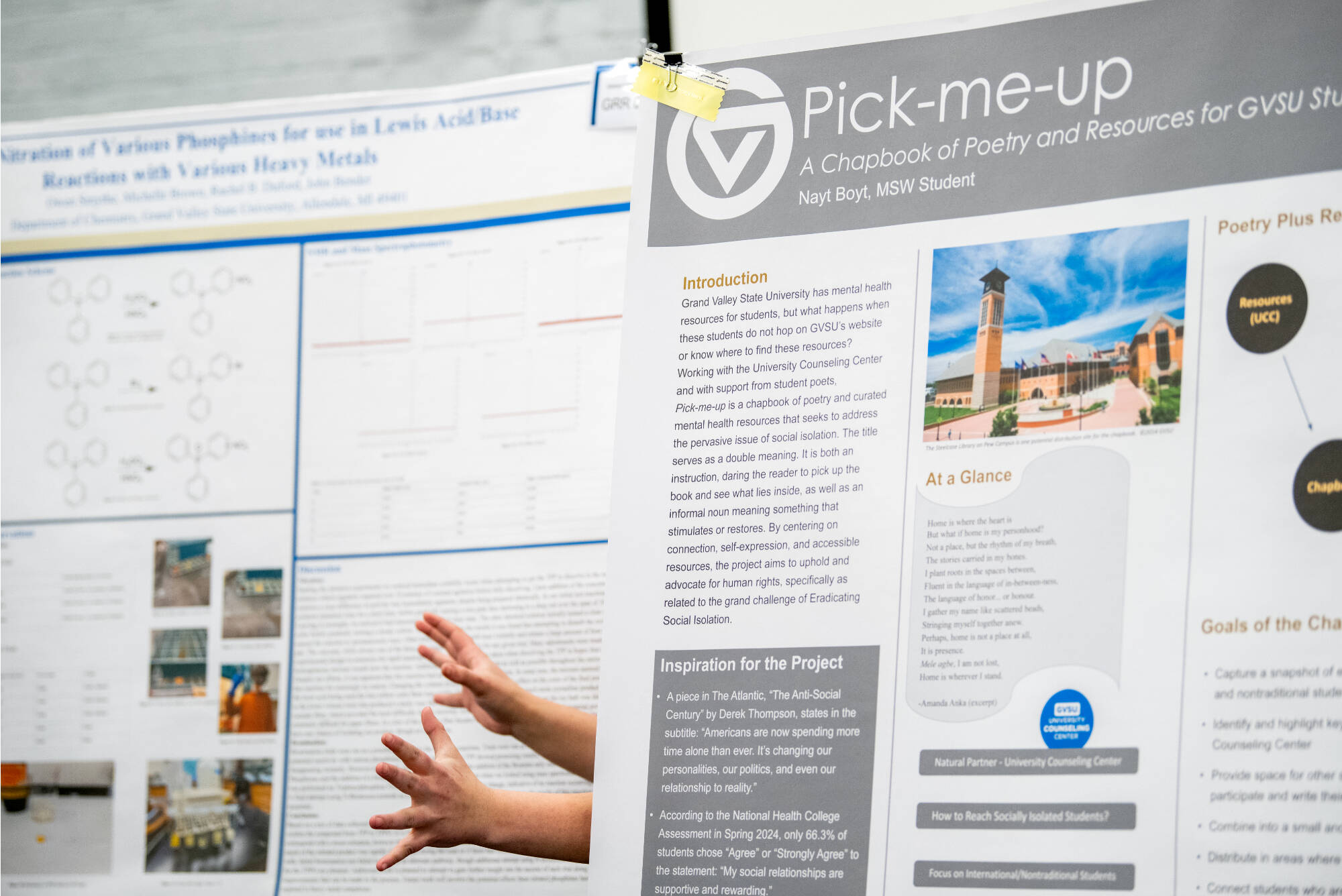 Rachel Duford, a junior chemistry and biochemistry major, gestures during her poster presentation during Student Scholars Day April 9.  Duford’s research, along with fellow students, was titled: “Impact of Nitration of Various Phosphines for Use in...